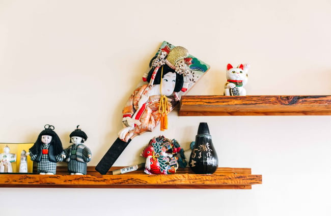 Japanese trinkets on a shelf.
