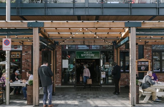 The exterior of the brick building of Riverside market.