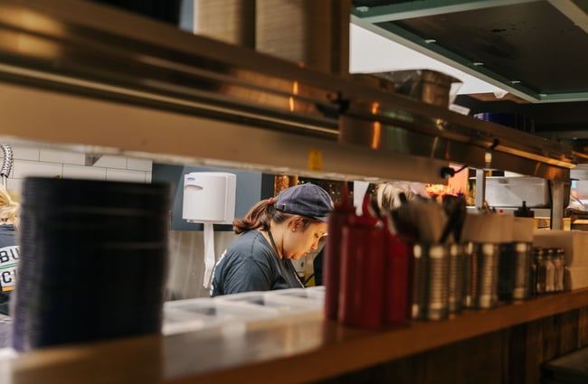 Chef working in the kitchen at Burger Culture.