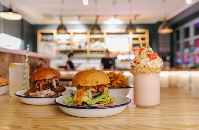 Close up of milkshake and burger from Burger Culture.