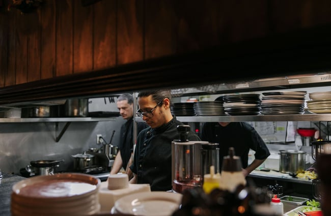 Chef in the kitchen at East St Cafe and Bar.