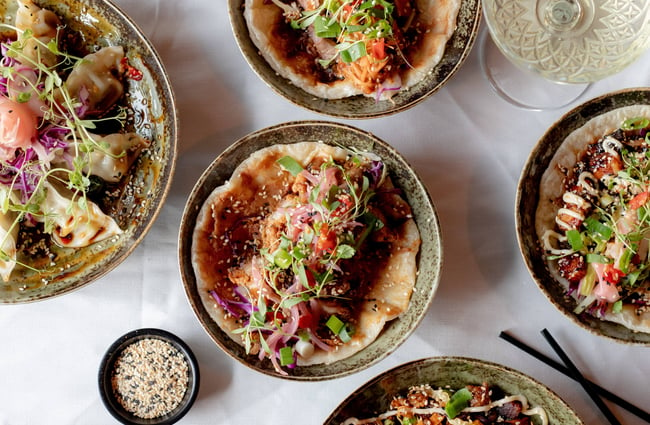 A flatlay of food at Evil Genius Bar and Eatery in Christchurch.