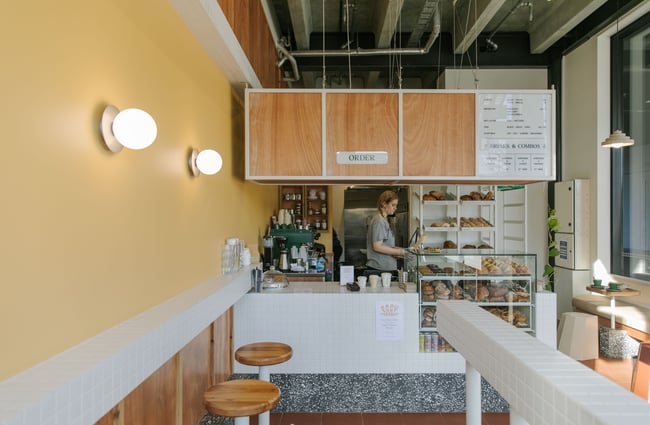 Yellow painted walls inside Grizzly Baked Goods.