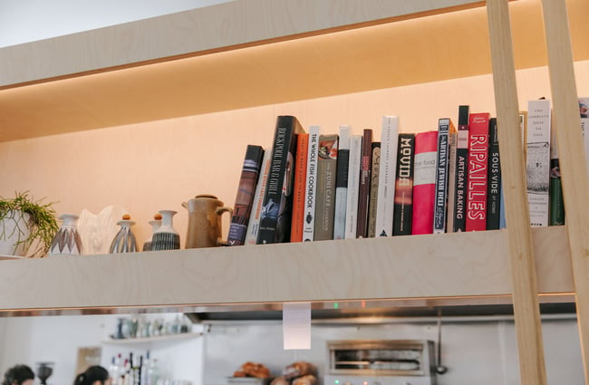 Close up of book shelf at Hardy St Eatery.