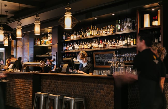 Staff working behind the bar at Harry's Hawker House.