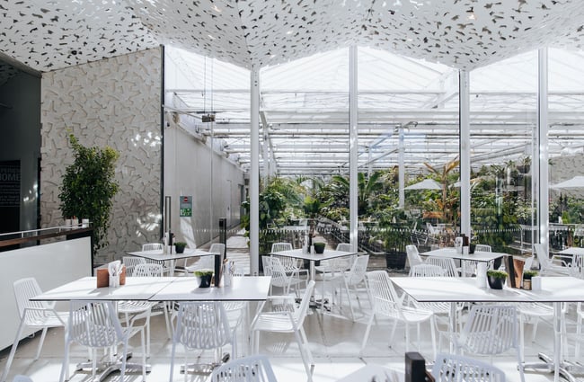 White tables and chairs at Ilex Café, Christchurch.