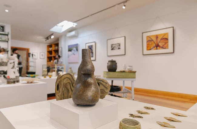 Close up of a bronzed coloured vase at Kiln Gallery.