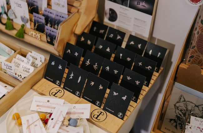 Earrings on display at Little Beehive Co-op.