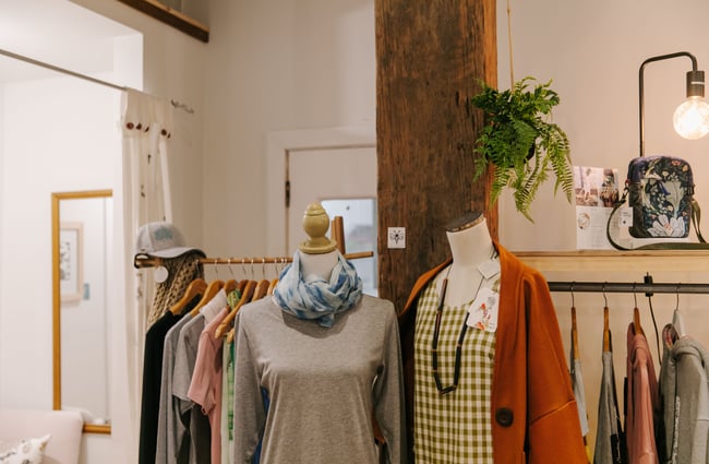 Mannequins with clothing at Little Beehive Co-op.