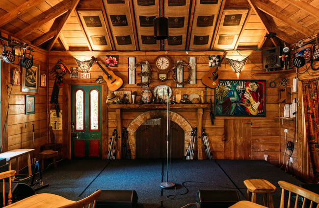 A makeshift stage inside a cosy nook at Mussel Inn.