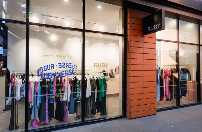 The full-height windows of the exterior of Ruby store in Christchurch.