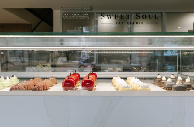 Sweet cakes in a cabinet.