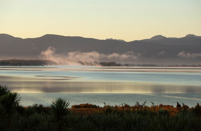 A large body of water at dusk.