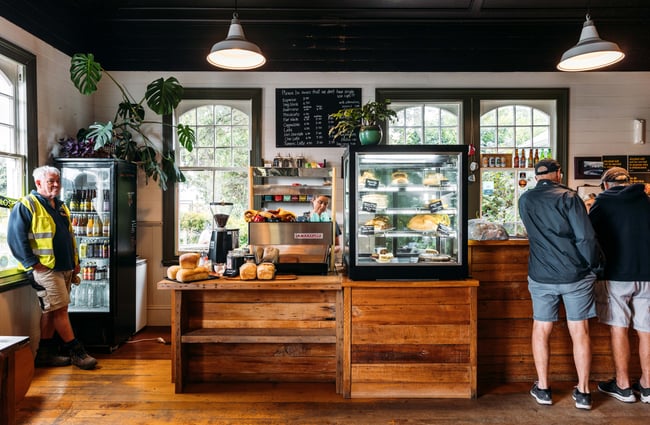 Customers at the wooden counter.