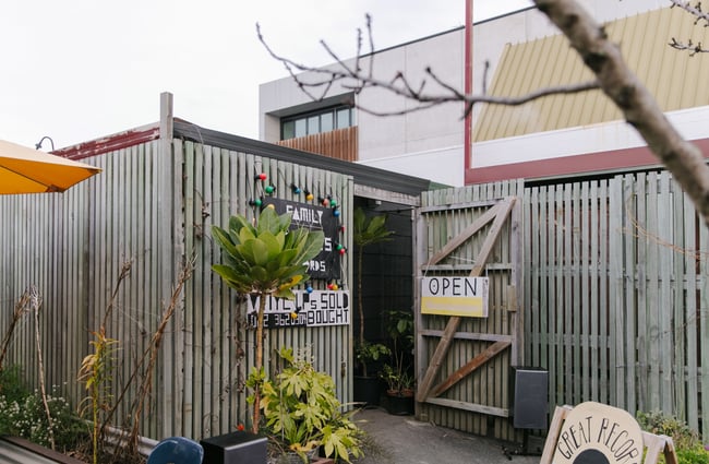 Gate with open sign at The Free House.