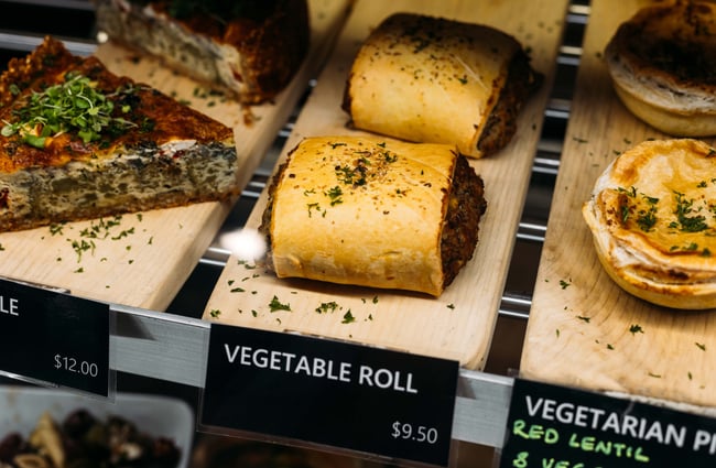 A close up of savouries in a counter.