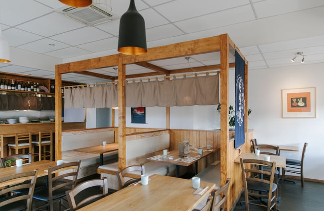 Interior overview of the restaurant, with Japanese booths.