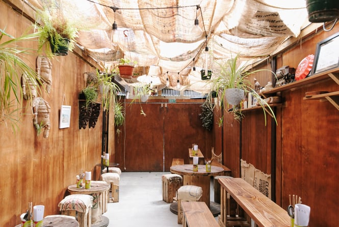 Inside a beautiful, rustic and sunny Satya Chai Lounge in Auckland.