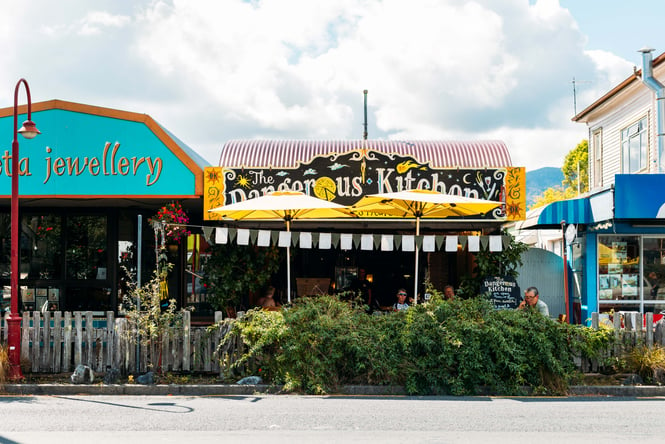 The colourful exterior of The Dangerous Kitchen on a sunny day.