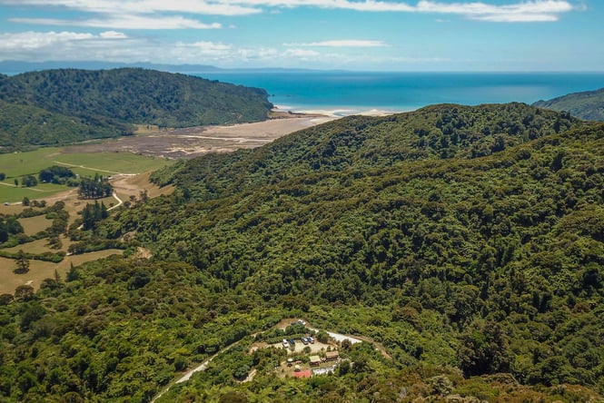 A Golden Bay beach photographed from on top of a hill in Golden Bay.