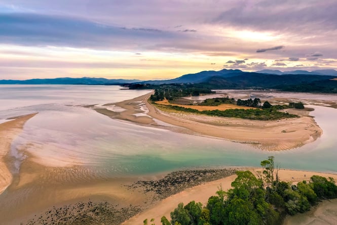 A view of an estuary at dusk in Golden Bay.