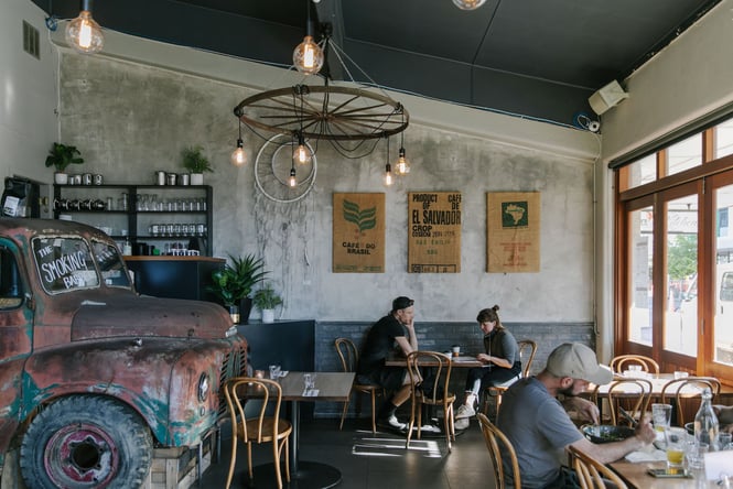 Customers sitting inside The Smoking Barrel restaurant.