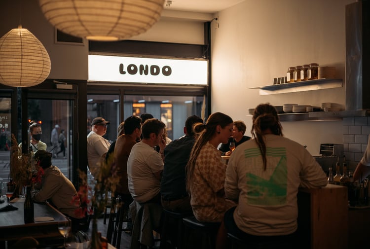 People dining at the bar at Londo.