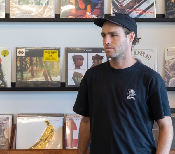 Joel from Holiday Records inside his Auckland CBD store.