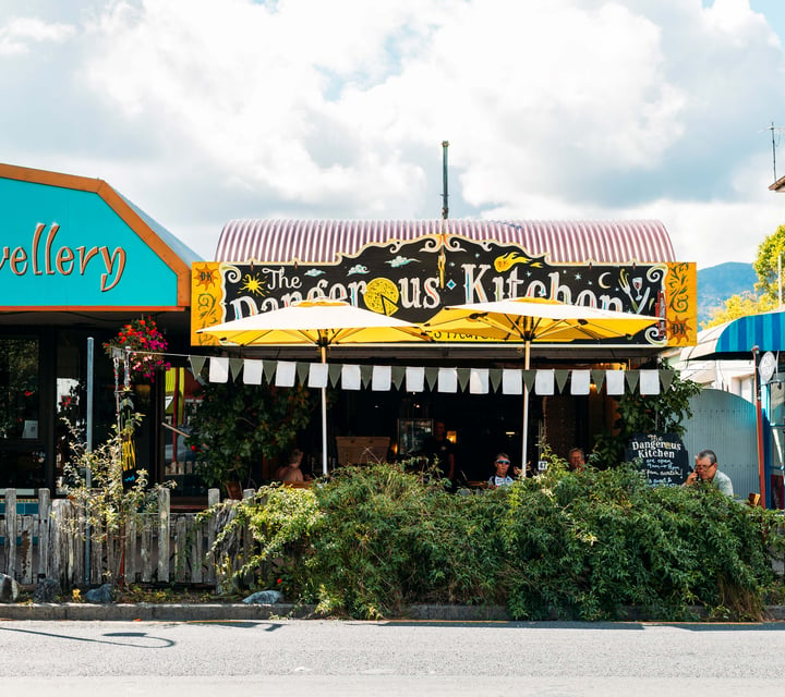 The colourful exterior of The Dangerous Kitchen on a sunny day.