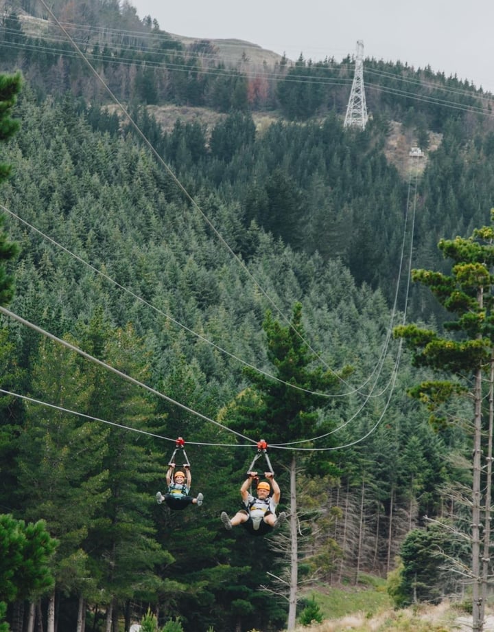 Someone zip-lining at Christchurch Adventure Park in the Port Hills, Christchurch.