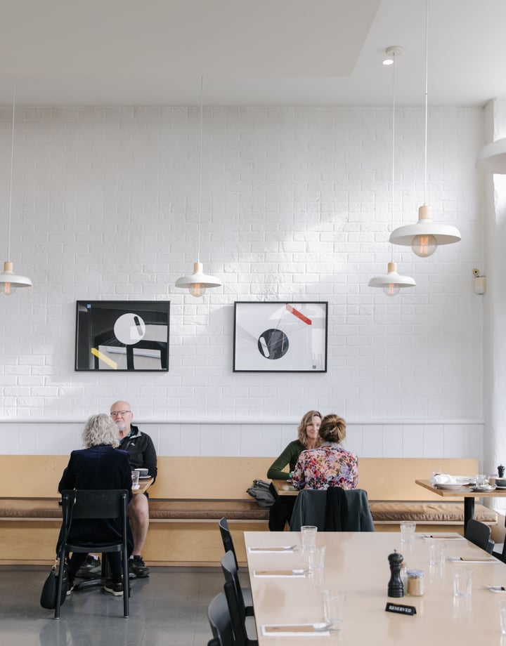 Customers dining inside Hardy St Eatery.