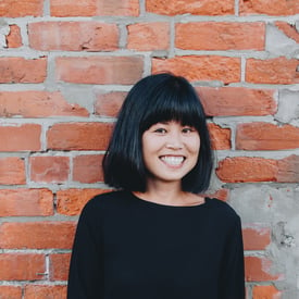 Profile headshot of Nancy Zhou.