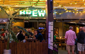 People waiting for a table outside Brew.