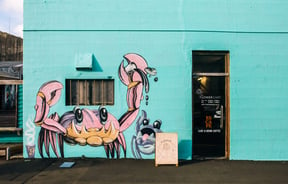 Crab painted on the exterior of Escape Coffee Roasters, New Plymouth.