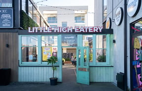 A painted blue entrance to 'Little High' in Christchurch.