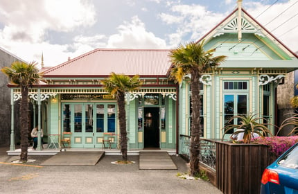 Exterior of mint-green character house in Petone Wellington