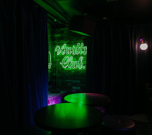 Austin Club green neon sign.