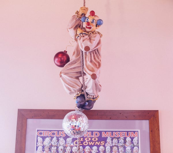 A clown hanging from the ceiling at Circus Circus.