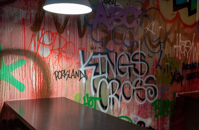 'Kings Cross' written on a wall.