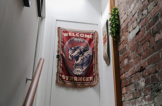 Welcome stranger banner on the door.