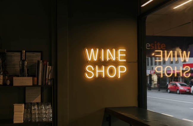 Wine shop neon light at Porta Via.