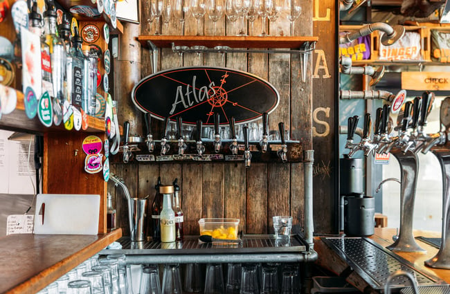 Behind the bar at Atlas Beer Cafe in Queenstown.