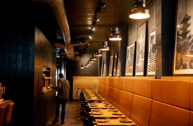 The long narrow dining area inside Azabu restaurant.
