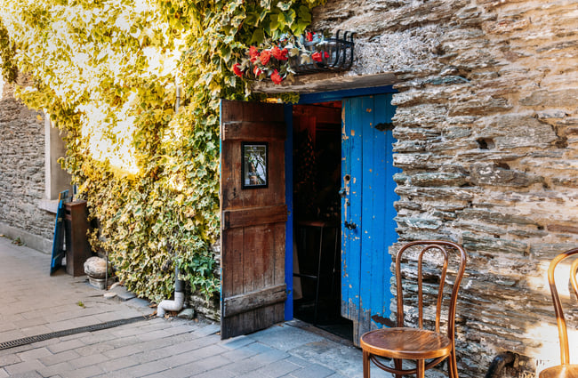 A blue door leading to a bar in Arrowtown.