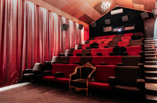 Red seating inside a cinema.