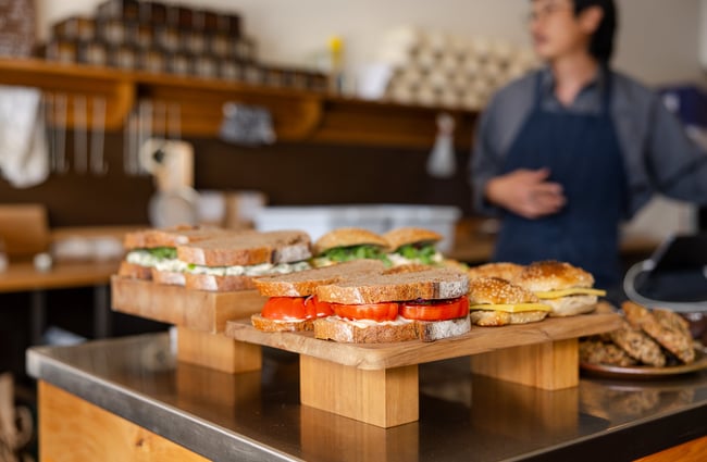 A close up of filled sandwiches on the counter at Florets Auckland.