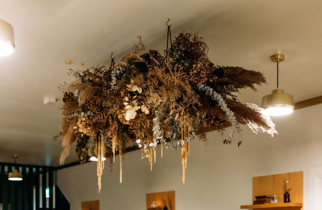 Dried flower arrangement on the ceiling at Fork N Knife, New Plymouth.
