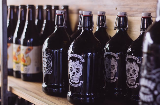 Dark bottles with skull patterns.
