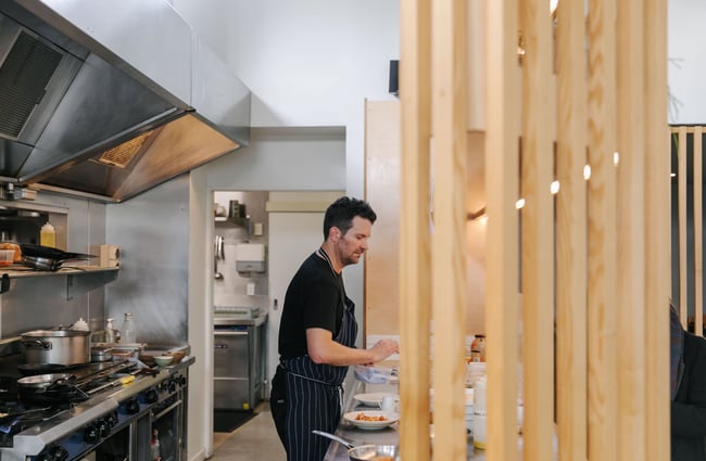 Chef in the kitchen at Hardy St Eatery.