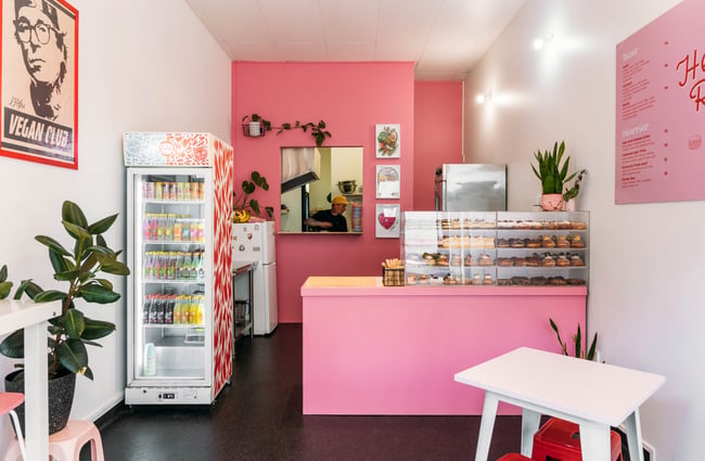 The pink interior of Hello Rosie cafe in Hamilton.